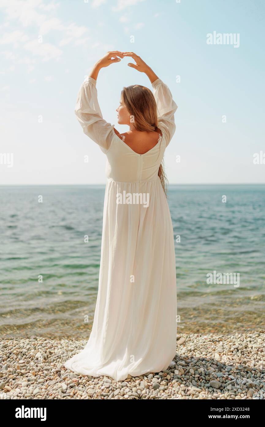 Woman raises hands water out hi-res stock photography and images - Alamy