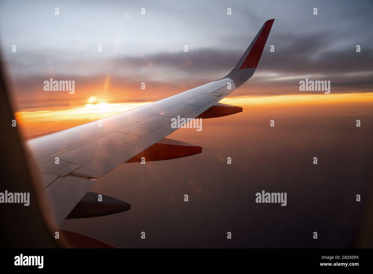 Airplane wing against breathtaking sunrise hi-res stock photography and ...