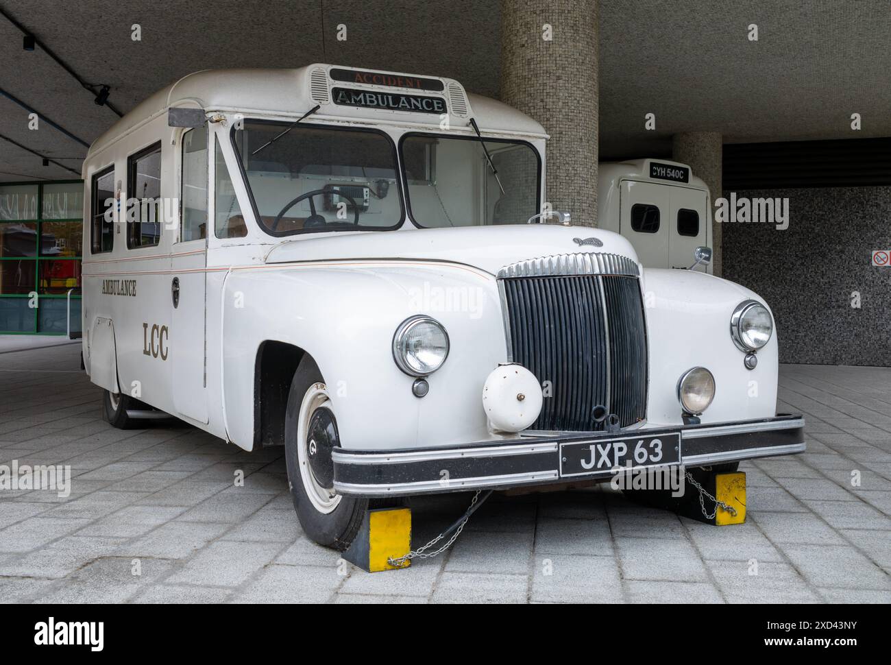 A vintage 1949 Daimler DC27 ambulance on display outside the headquarters of the London Ambulance Service in Waterloo Road, London, UK Stock Photo