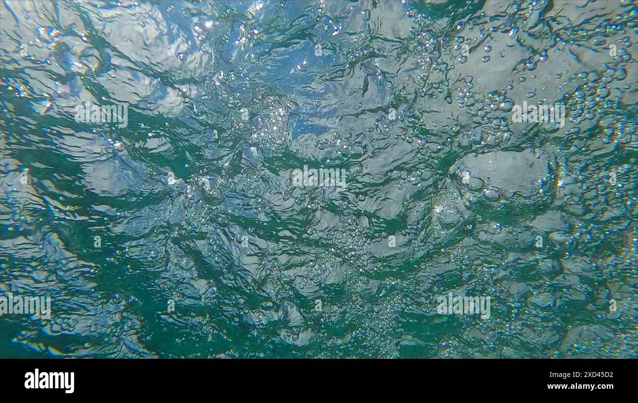 Underwater view on the churning water surface Stock Photo - Alamy
