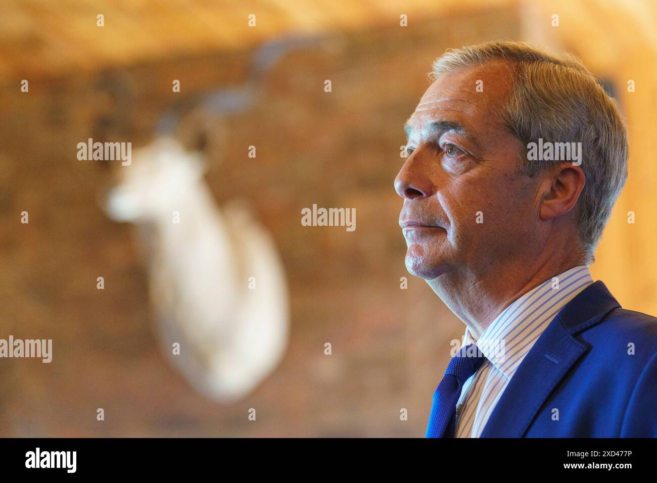 Reform UK leader Nigel Farage speaks during a visit to Catton Hall in Frodsham, Cheshire, while on the General Election campaign trail. Picture date: Thursday June 20, 2024. Stock Photo