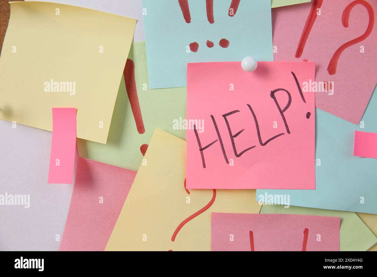 Notes with word Help and symbols on board, closeup Stock Photo - Alamy