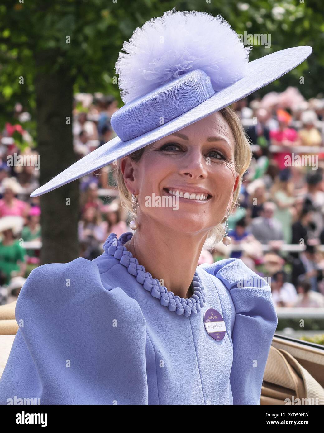 Ascot, Berkshire, UK. 20th June, 2024. Zara Tindall, guest and Mike Tindall in their carriage. The Royal Procession with members of the Royal family and their guests in carriages makes its way through the parade ring at Royal Ascot on Day 3, Ladies Day, of the horse racing event. Royals and invited guests then mingle on the lawn before moving to the Royal enclosure. Credit: Imageplotter/Alamy Live News Stock Photo