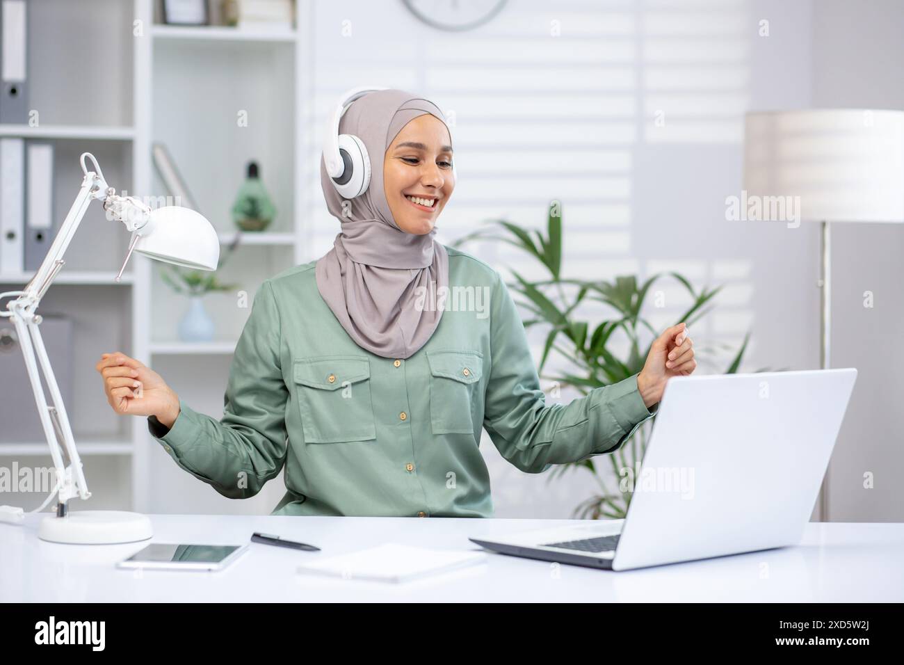 Happy asian female muslim hi-res stock photography and images - Alamy