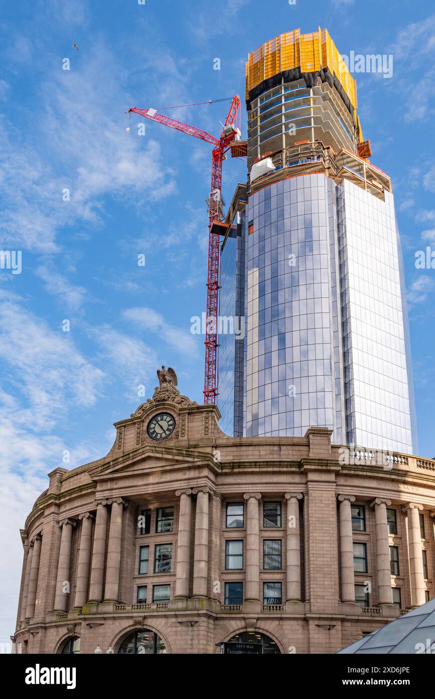 Boston, MA, US-April 29, 2024: View of construction of a new skyscraper above the city's historic South Station train station. Stock Photo