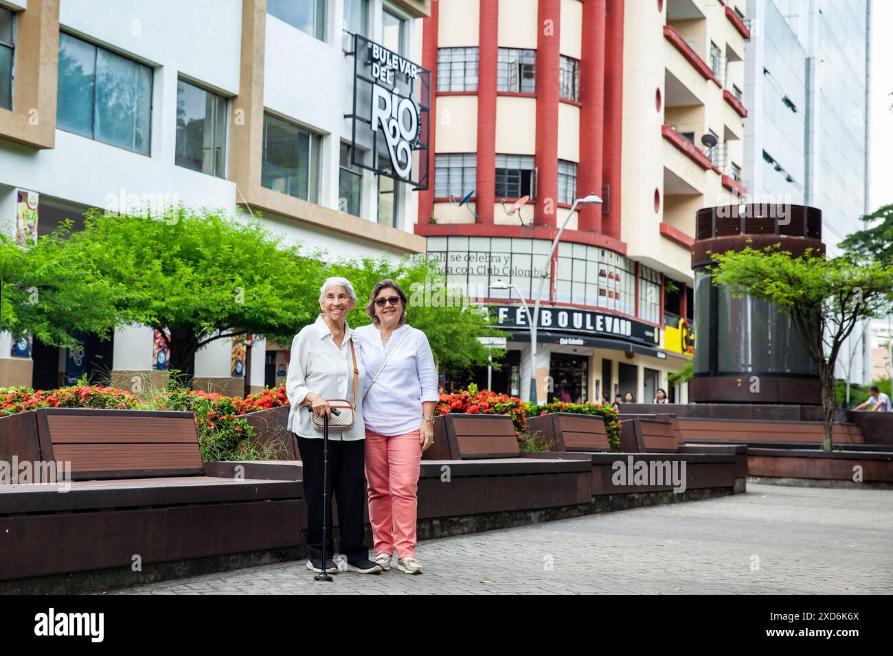 Cali, Colombia - June 17, 2024: Senior mother and daugther travelling togeher having fun. Senior adults in Cali Colombia. Senior lifestyle. Senior tra Stock Photo