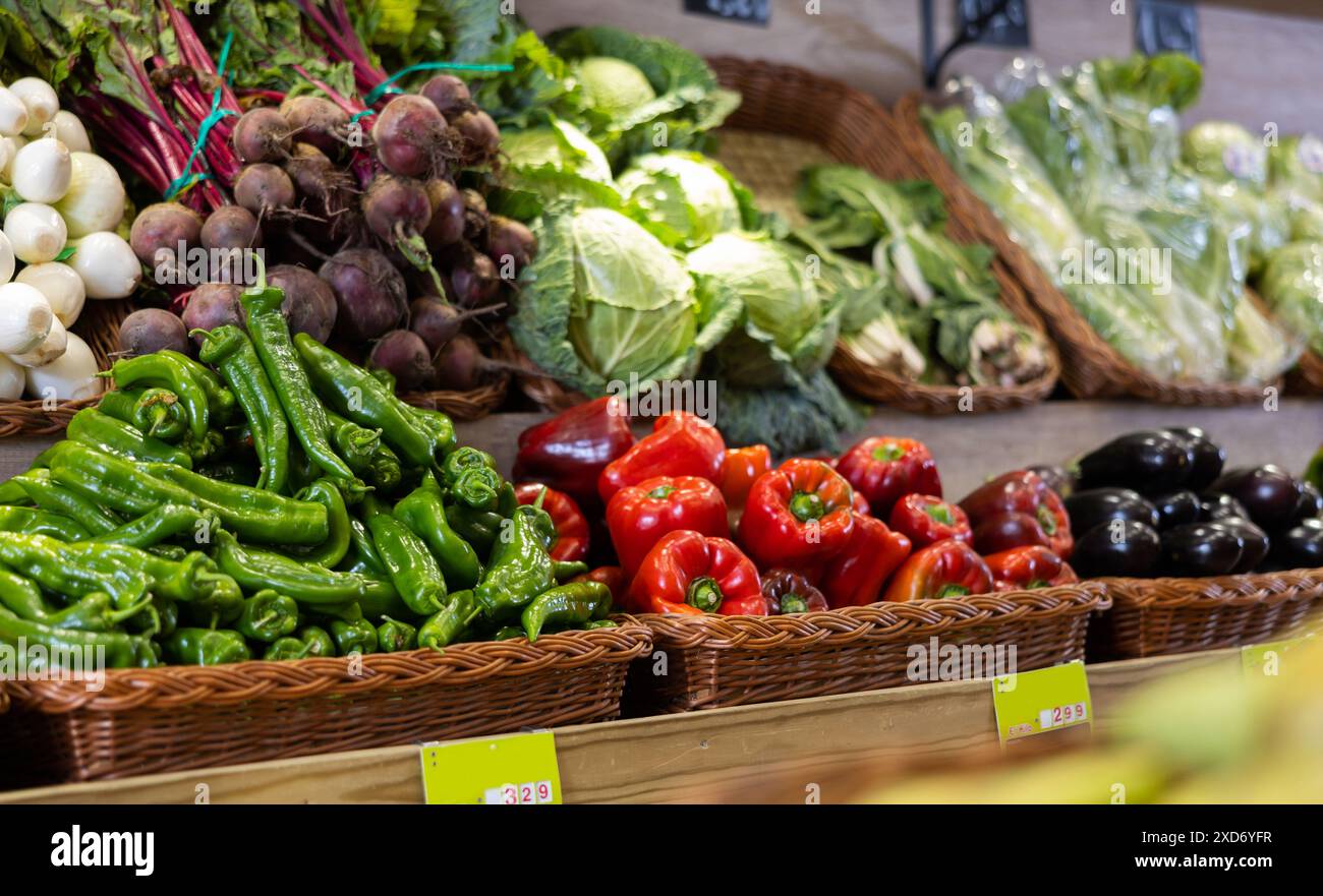 Stand of baskets full of fruits and vegetables in greengrocery Stock ...