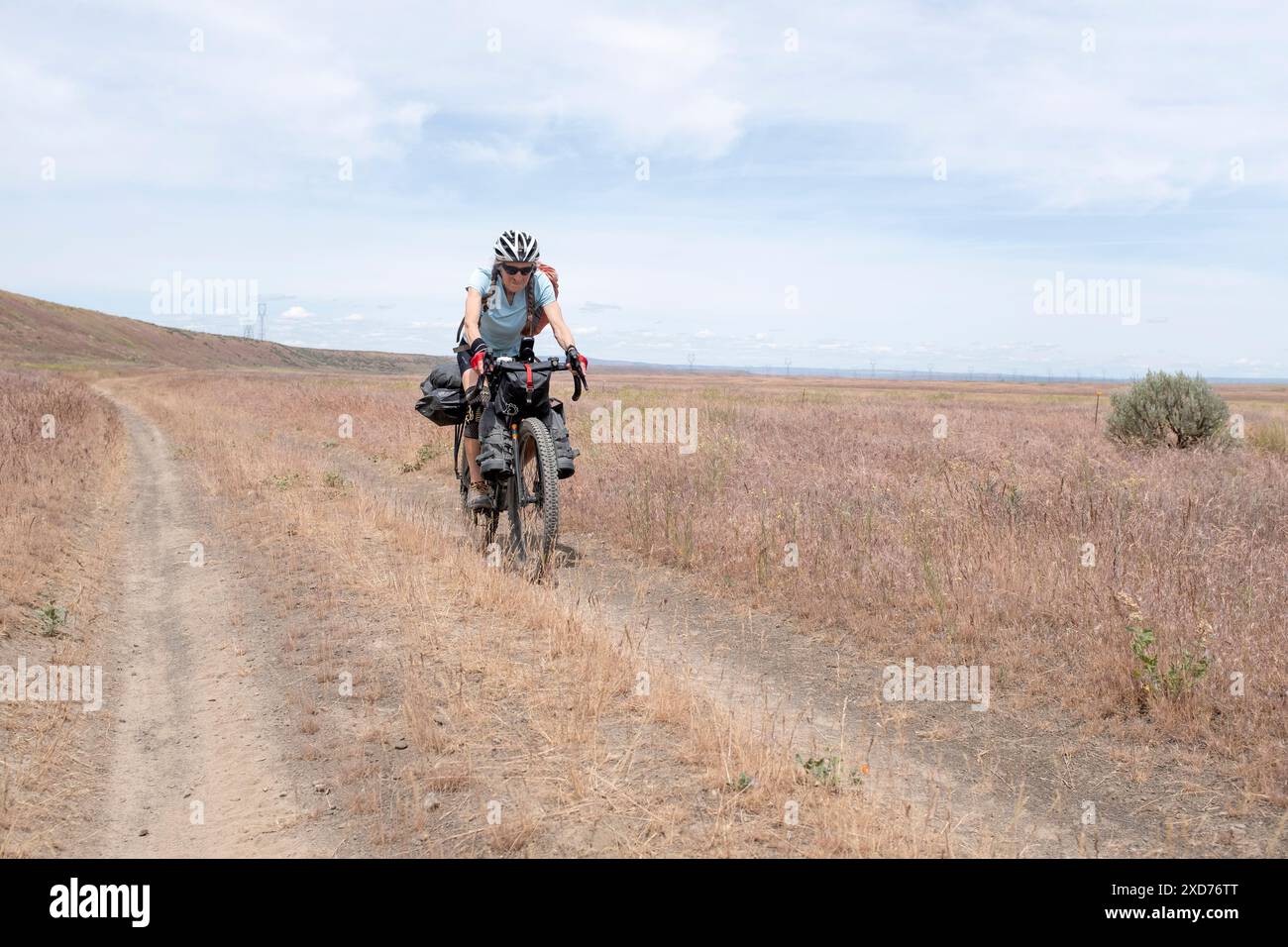 WA24897-00.......WASHINGTON - Vicky Spring Bike-Packing on an open dirt road east of Ephrata. Part of the Cross Washington Mountain Bike Route. MR#S1 Stock Photo