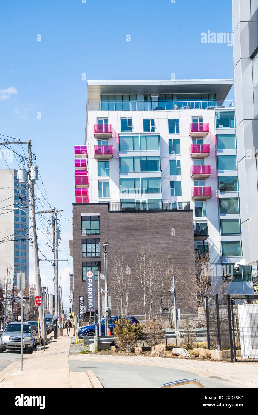 Pink glass blocked balconies on an apartment building in downtown