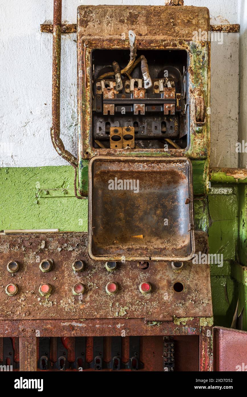 Rusty Metal Gear Detail With Grunge Electrical Box In An Old Abandoned Drill Factory Stock Photo