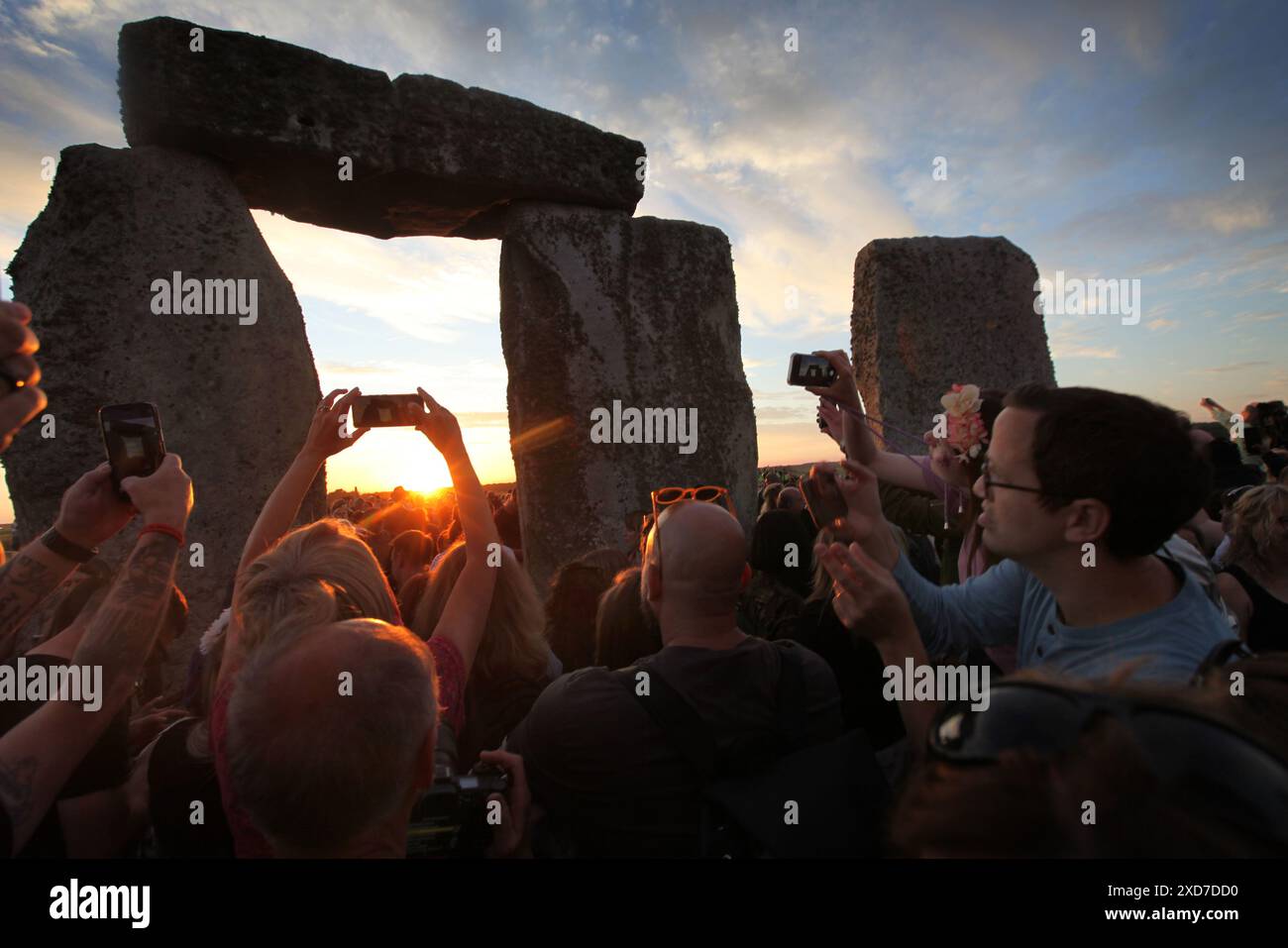 Salisbury, England, UK. 20th June, 2024. People use their phones to