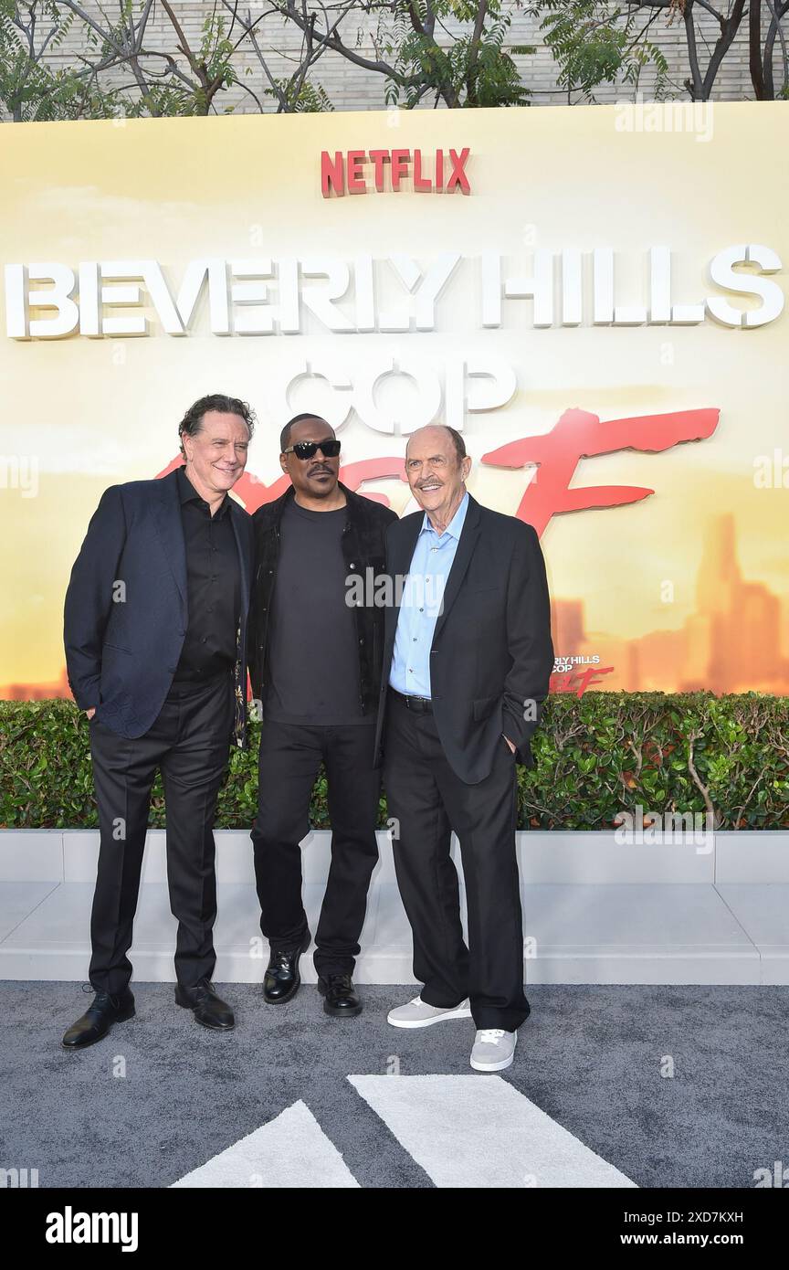 Judge Reinhold, Eddie Murphy and John Ashton arrive at the premiere of ...