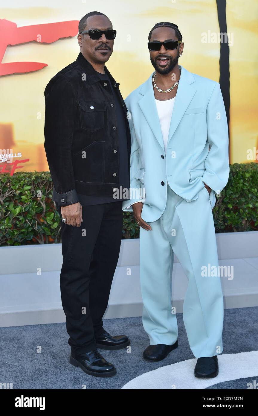 Eddie Murphy, left, and Big Sean arrive at the premiere of 