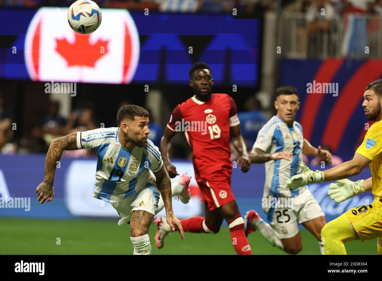 XX () vies for the ball with X during the Copa America USA 2024, group