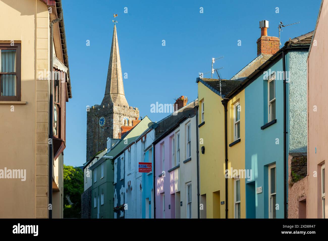 Summer morning on Cresswell Street in Tenby, Pembrokeshire, Wales. Stock Photo