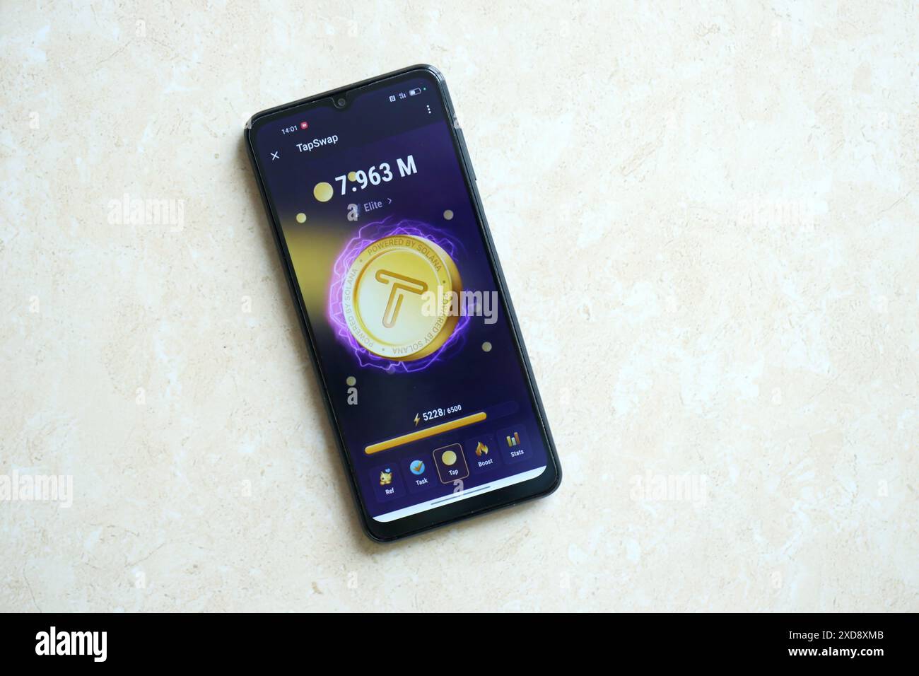 KYIV, UKRAINE - APRIL 20, 2024 Tap Swap telegram bot on smartphone screen.  Tap Swap is a viral Telegram based crypto game for earn tokens by managing  a virtual crypto exchange Stock Photo - Alamy