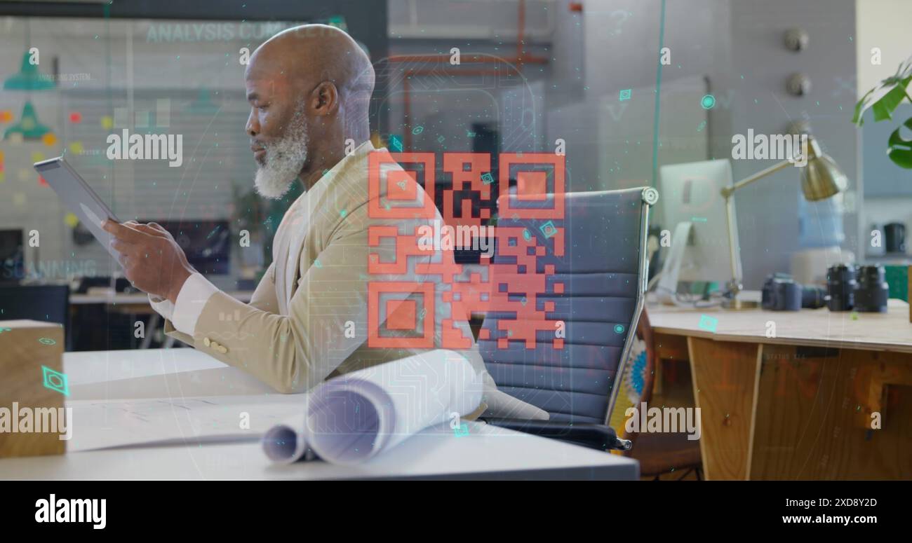 Image of qr code and data processing over african american businessman using tablet Stock Photo
