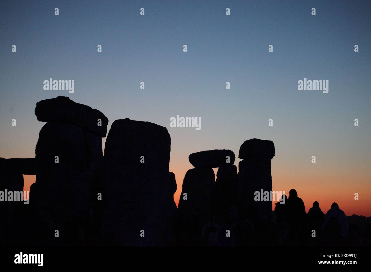 June 21, 2024, Salisbury, England, UK The sun gives off an orange glow