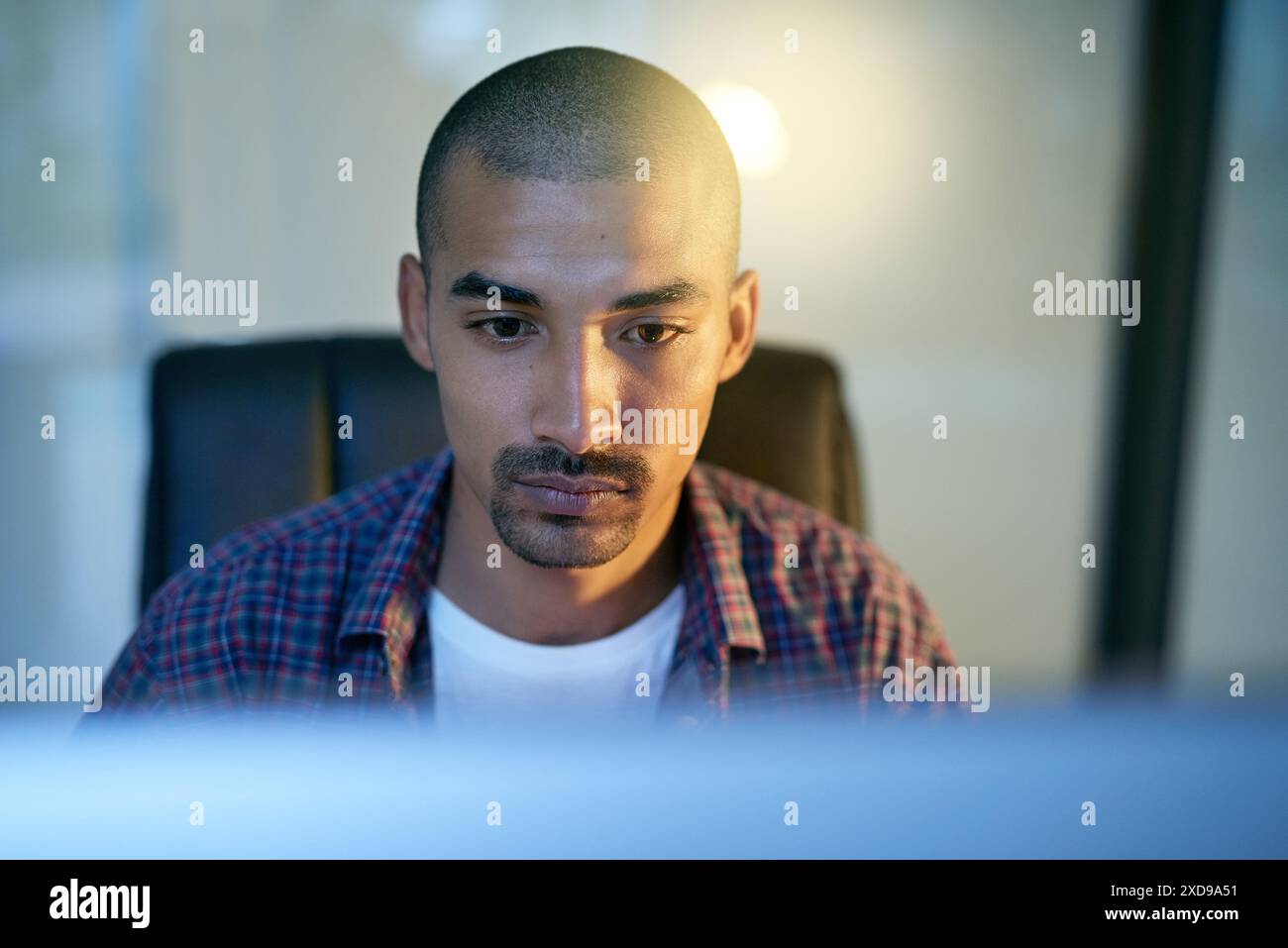 Computer, face and serious with developer man in office for coding, programming or web design. Internet, software and technology with confident Stock Photo