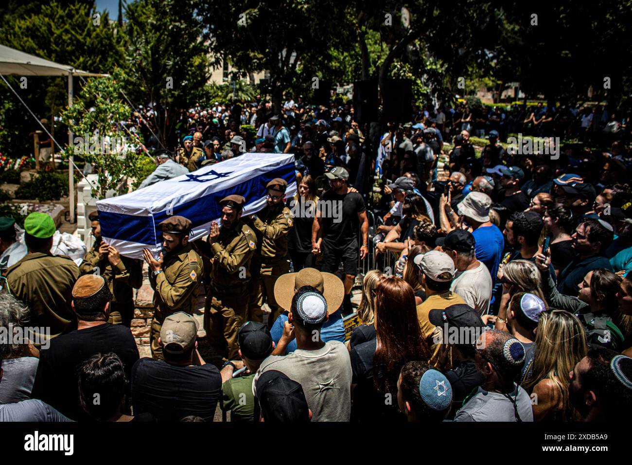 Israeli soldiers carry the coffin of fallen soldier Omer Smadga throw a