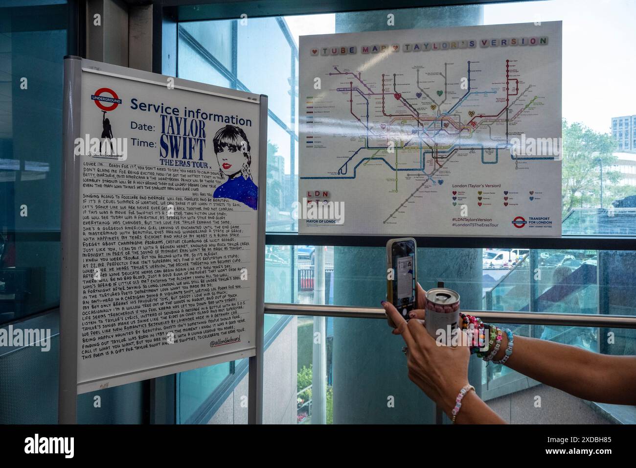 London, UK.  21 June 2024.  A TFL message for Taylor Swift and a customised Taylor Swift TFL Underground map (each station renamed and each tube line renamed) at Wembley Park tube station.  Taylor Swift fans ('Swifties') on Olympic Way outside Wembley Stadium for the first of Taylor Swift’s Eras Tour June concerts.  Taylor Swift will perform at Wembley Stadium for three nights, beginning 21 June, and then five nights in August. Credit: Stephen Chung / Alamy Live News Stock Photo