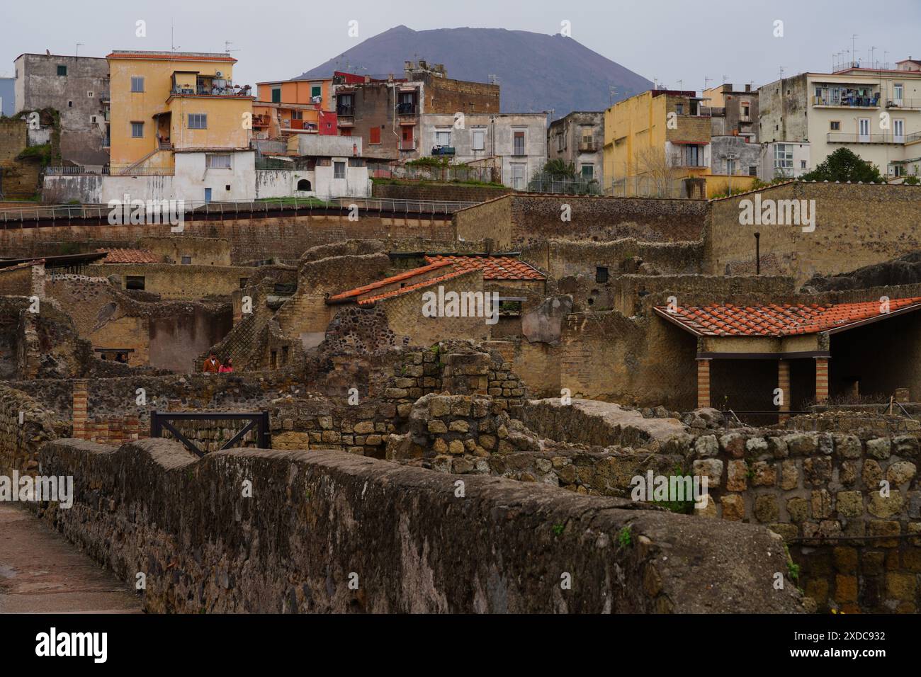 HERCULANEUM, ITALY -10 MAR 2024 – View of Herculaneum (Ercolano), the antique Roman city buried under ash by the eruption of the Mount Vesuvius volcan Stock Photo