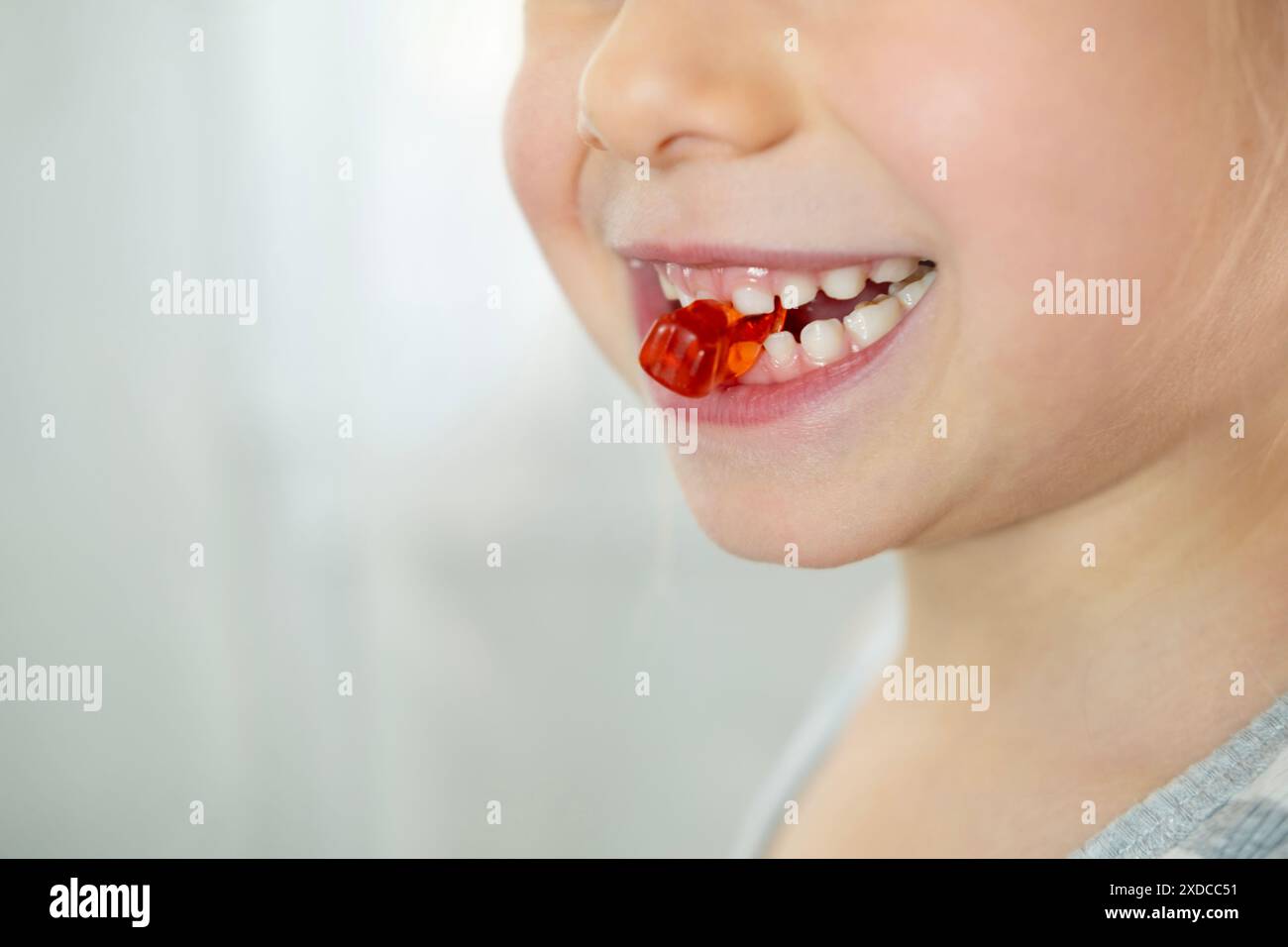 closeup preschool child, girl 5 years old wants eat gelatinous sweets