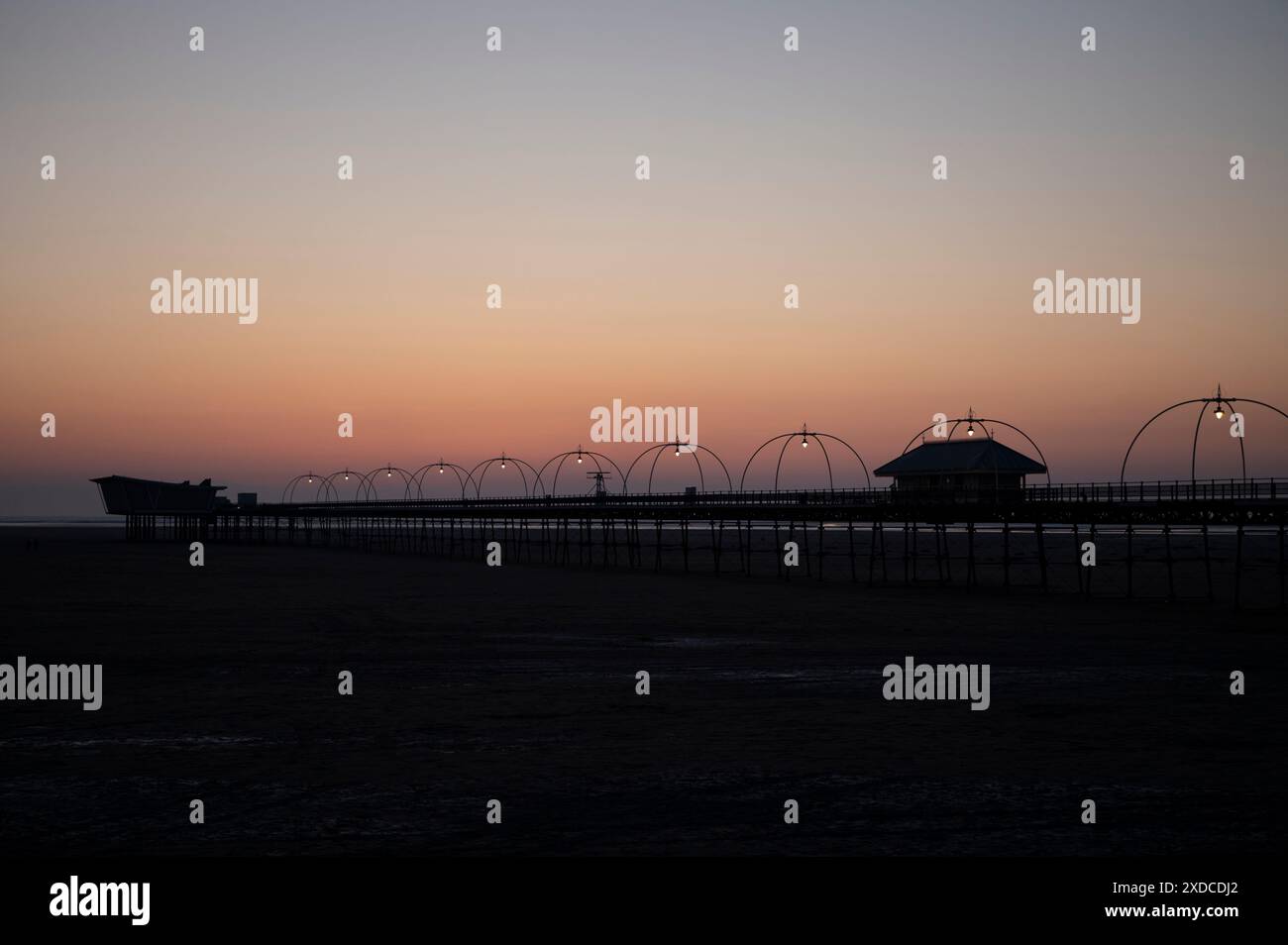 Southport Pier and beach when the tide was out. Merseyside, UK