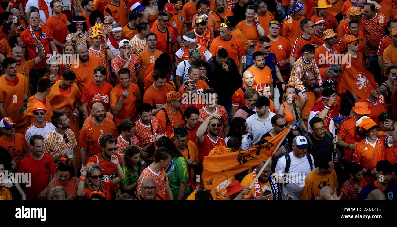 LEIPZIG - Dutch fans walk behind the Oranjebus during the fan walk to ...