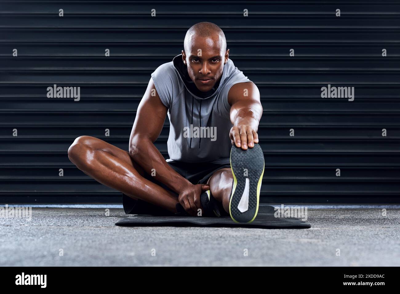 Athlete cool down stretching hi-res stock photography and images - Alamy