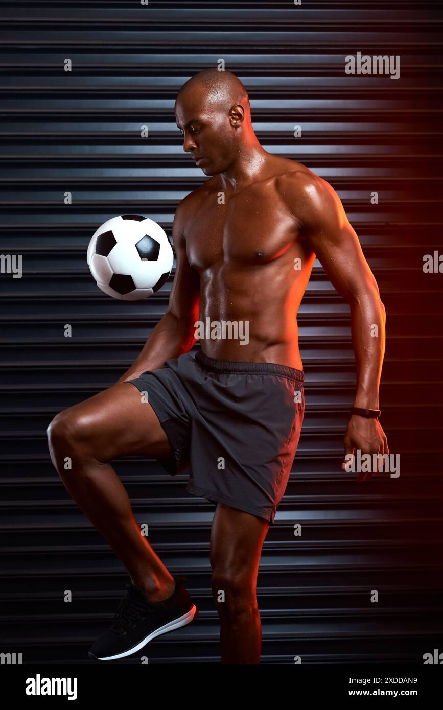 Soccer, ball and black man for practice with sport, physical fitness or ...