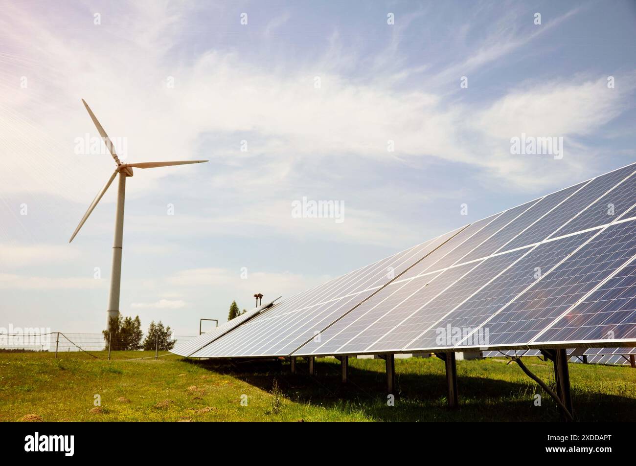 Power plant. Wind turbine and solar panels Stock Photo - Alamy
