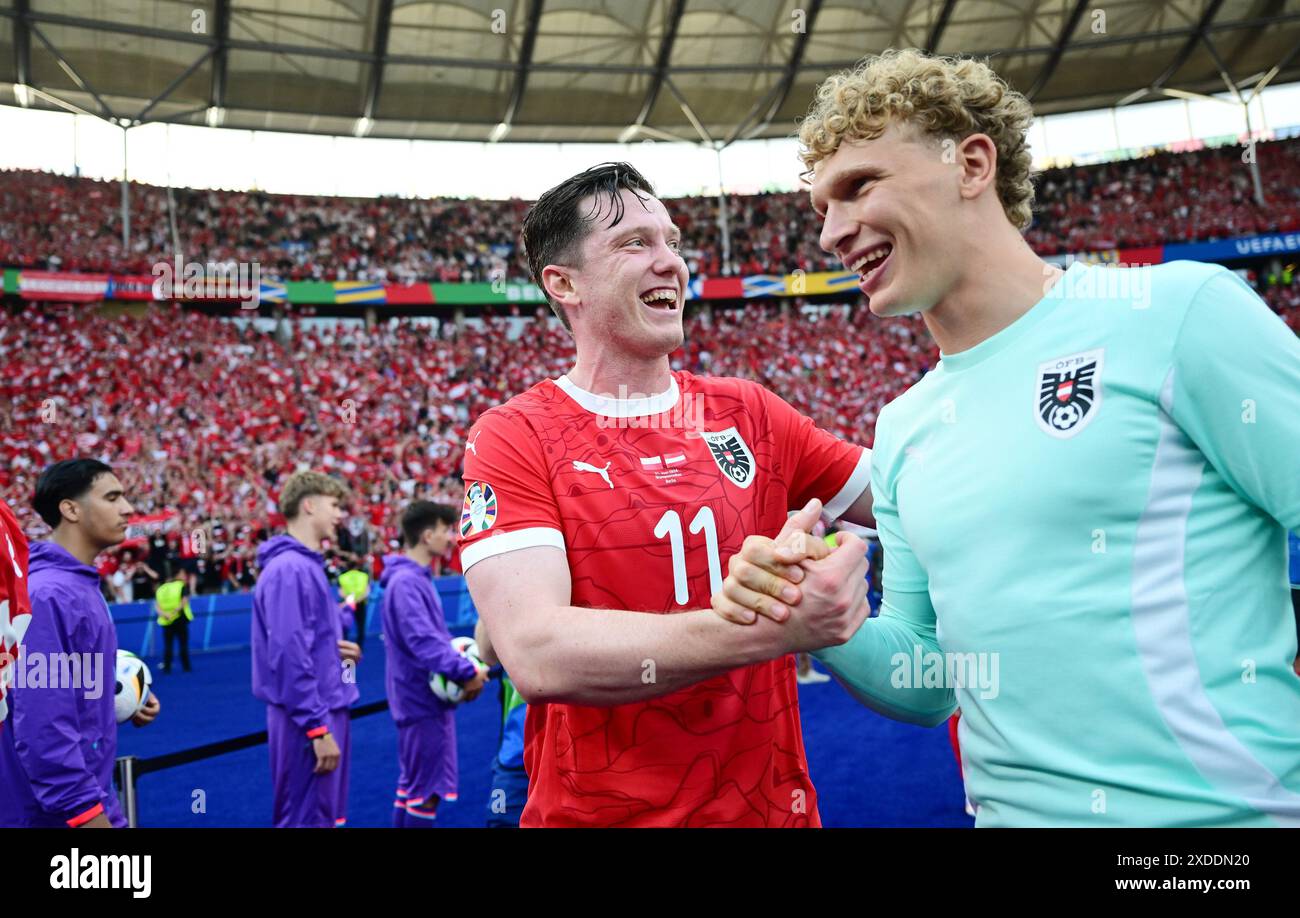 Schlussjubel v.l. Michael Gregoritsch, Leopold Querfeld (Oesterreich) Berlin, 21.06.2024, Fussball, UEFA EURO 2024 in Deutschland, Gruppenphase, Polen - Oesterreich Credit: PRESSINPHOTO SPORTS AGENCY/Alamy Live News Stock Photo