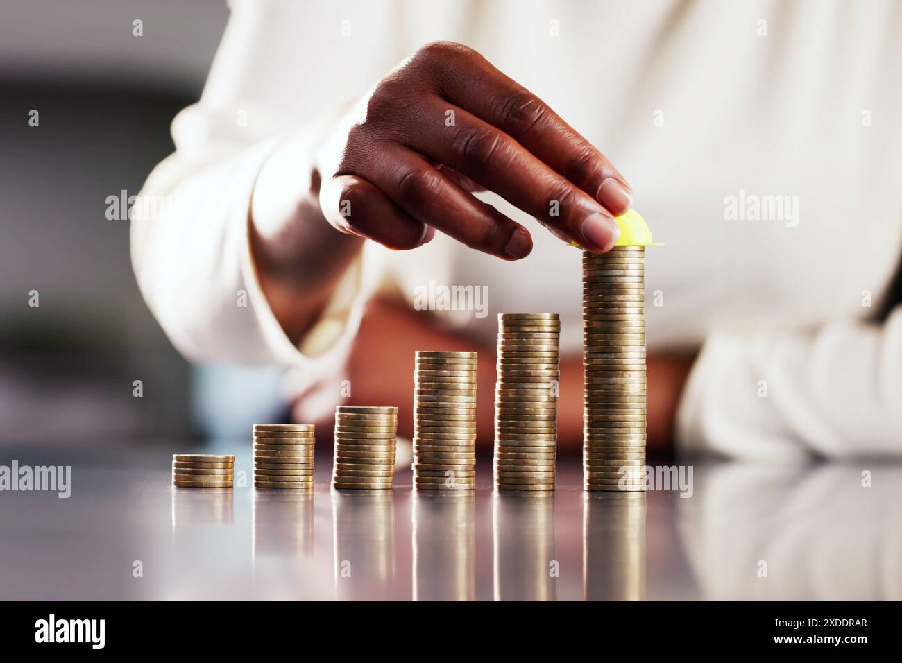 The African American woman in the office is calculating construction ...