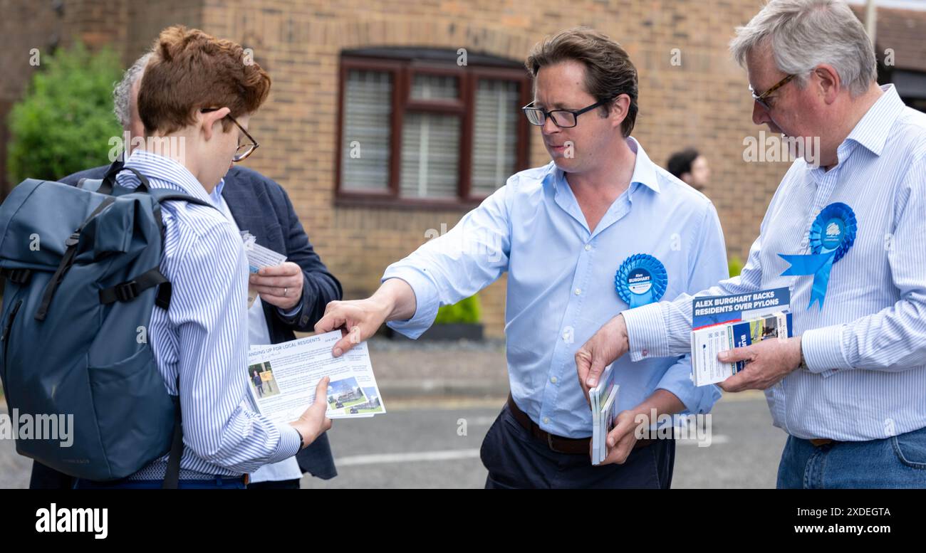 Brentwood Essex 22nd June 2024 Alex Burghart, (Glasses, blue shirt) Conservative Parliamentary candidate for Brentwood and Ongar, out campaigning in Brentwood for the General Election. Credit: Ian Davidson/Alamy Live News Stock Photo