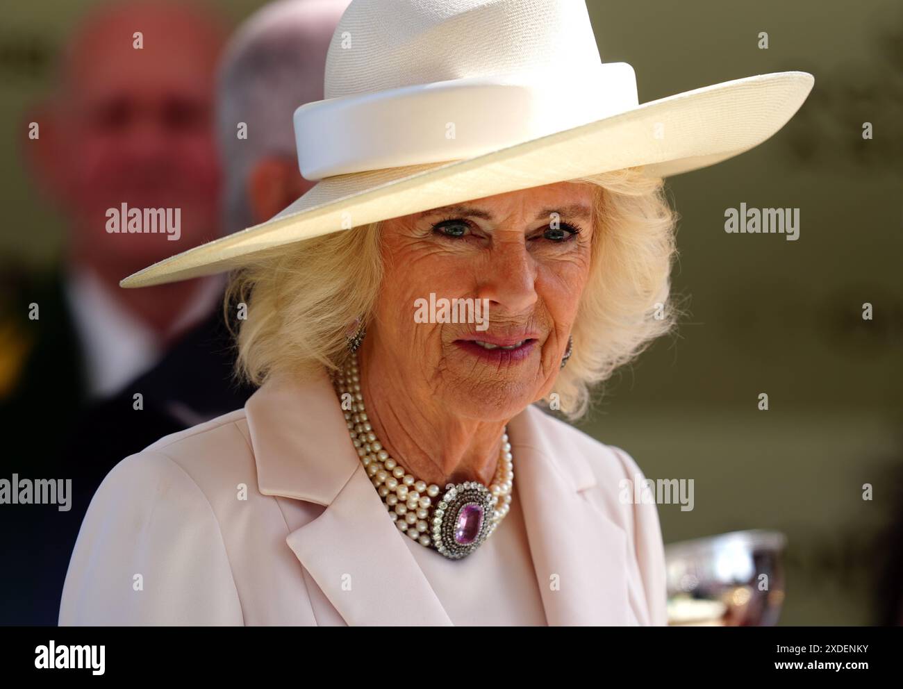 Queen Camilla before presenting the trophy to the winner of the Queen