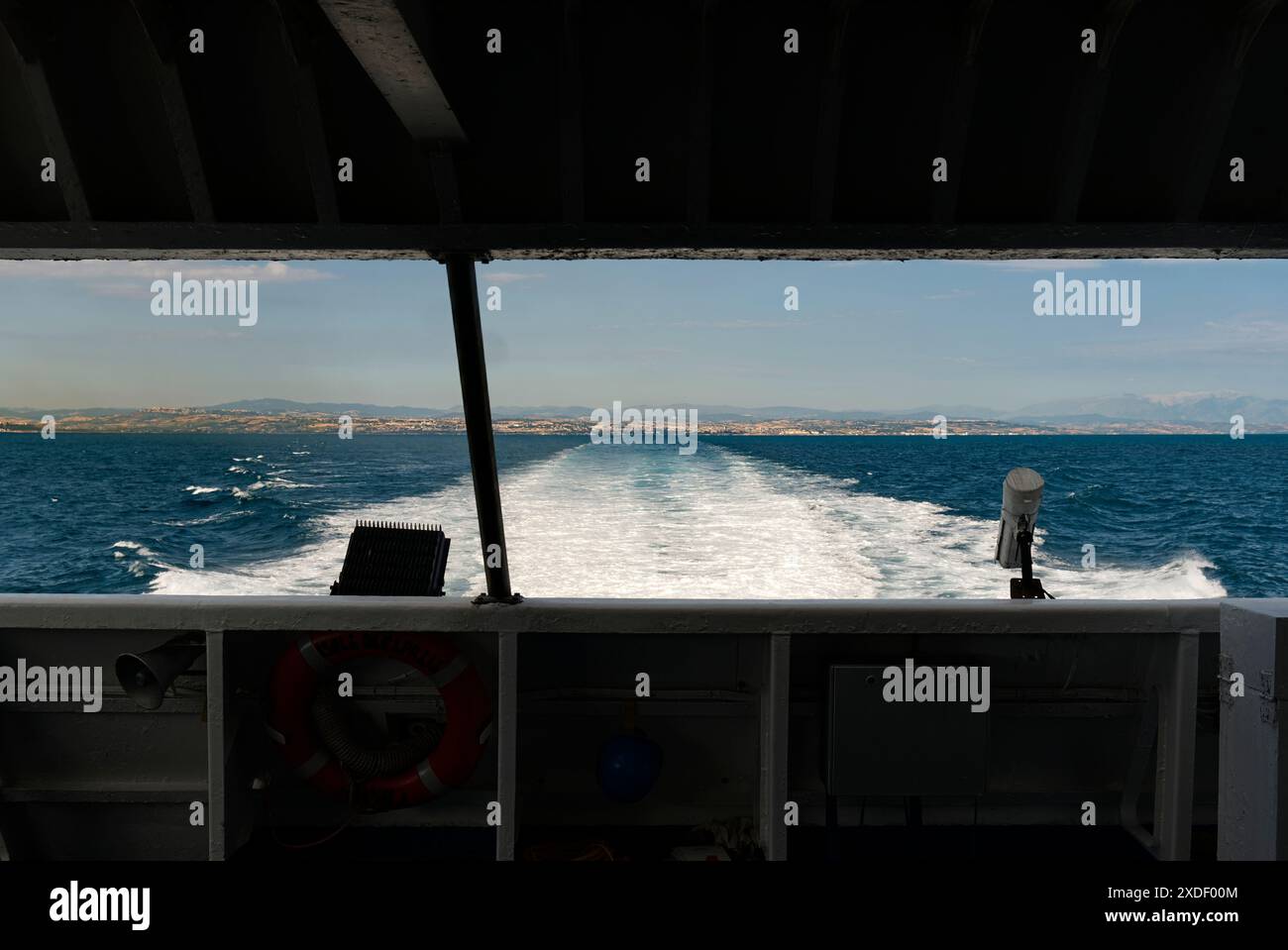 Trail on water surface behind of fast moving motor boat Stock Photo - Alamy