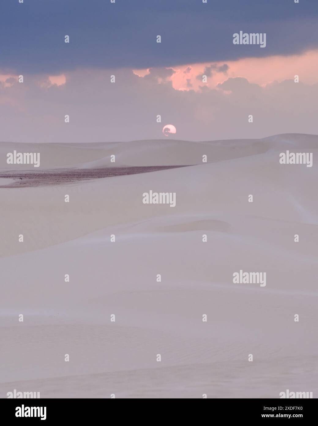 Sunset over the expansive Zahek Dunes in Socotra, Yemen, with the sun ...