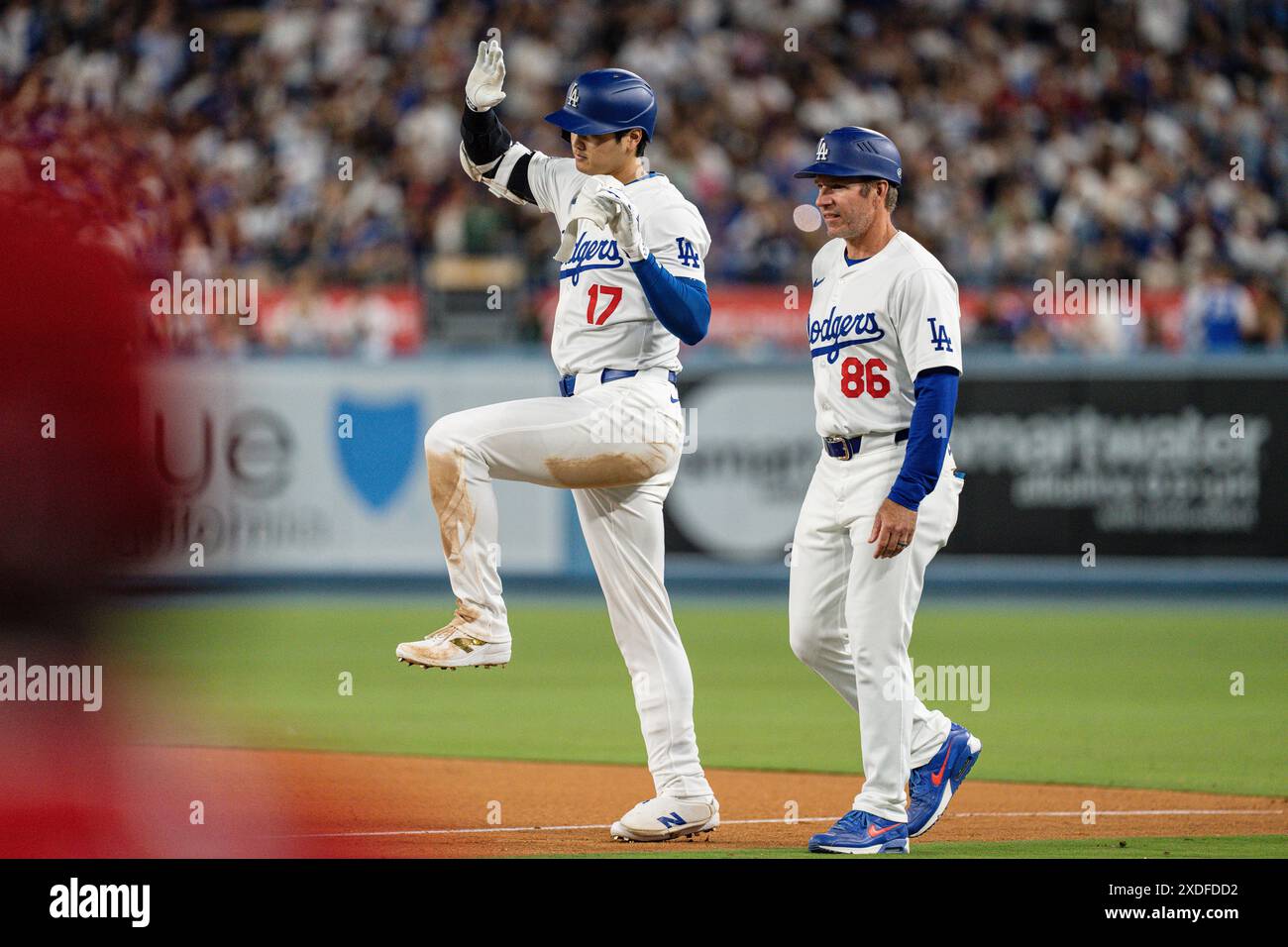 Los Angeles Dodgers designated hitter Shohei Ohtani (17) celebrates an ...