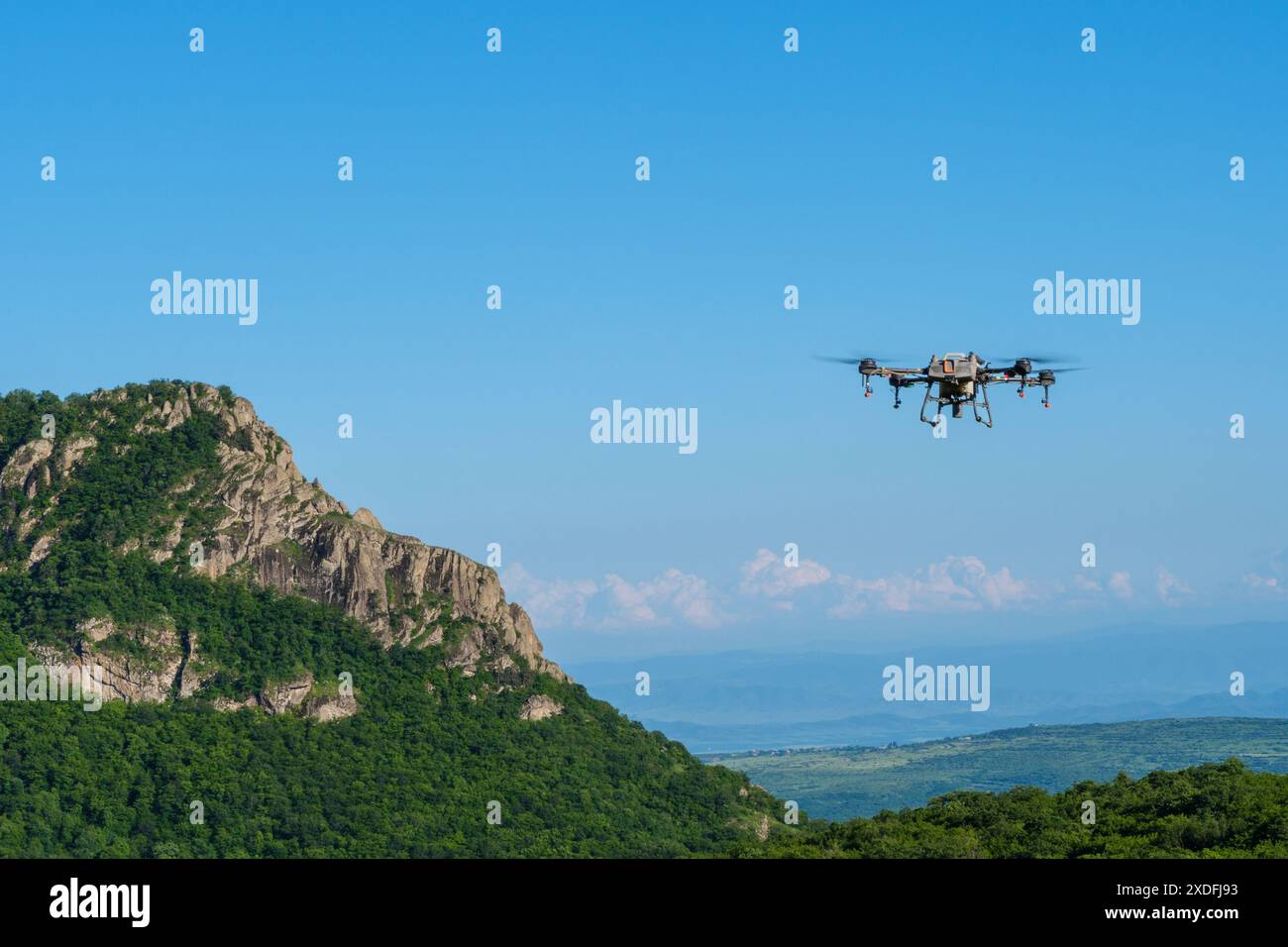 Drone flying over mountainous landscape hi-res stock photography and ...