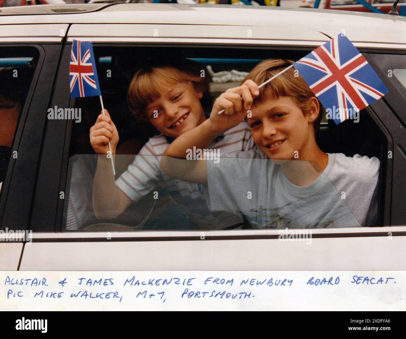 ALISTAIR AND JAMES MacKENZIE THE FIRST PASSENGERS, SEACAT, HOVERSPEED'S NEW SERVICE TO THE ISLE OF WIGHT FROM PORTSMOUTH  1990 PIC MIKE WALKER 1990 Stock Photo