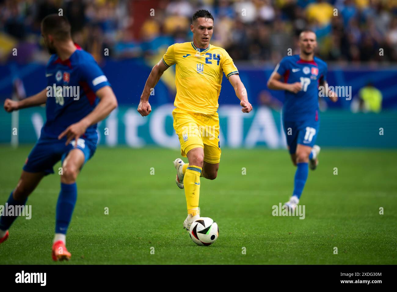 Dusseldorf, Germany. 21 June 2024. Oleksandr Tymchyk of Ukraine in action during the UEFA EURO 2024 group stage football match between Slovakia and Ukraine. Credit: Nicolò Campo/Alamy Live News Stock Photo