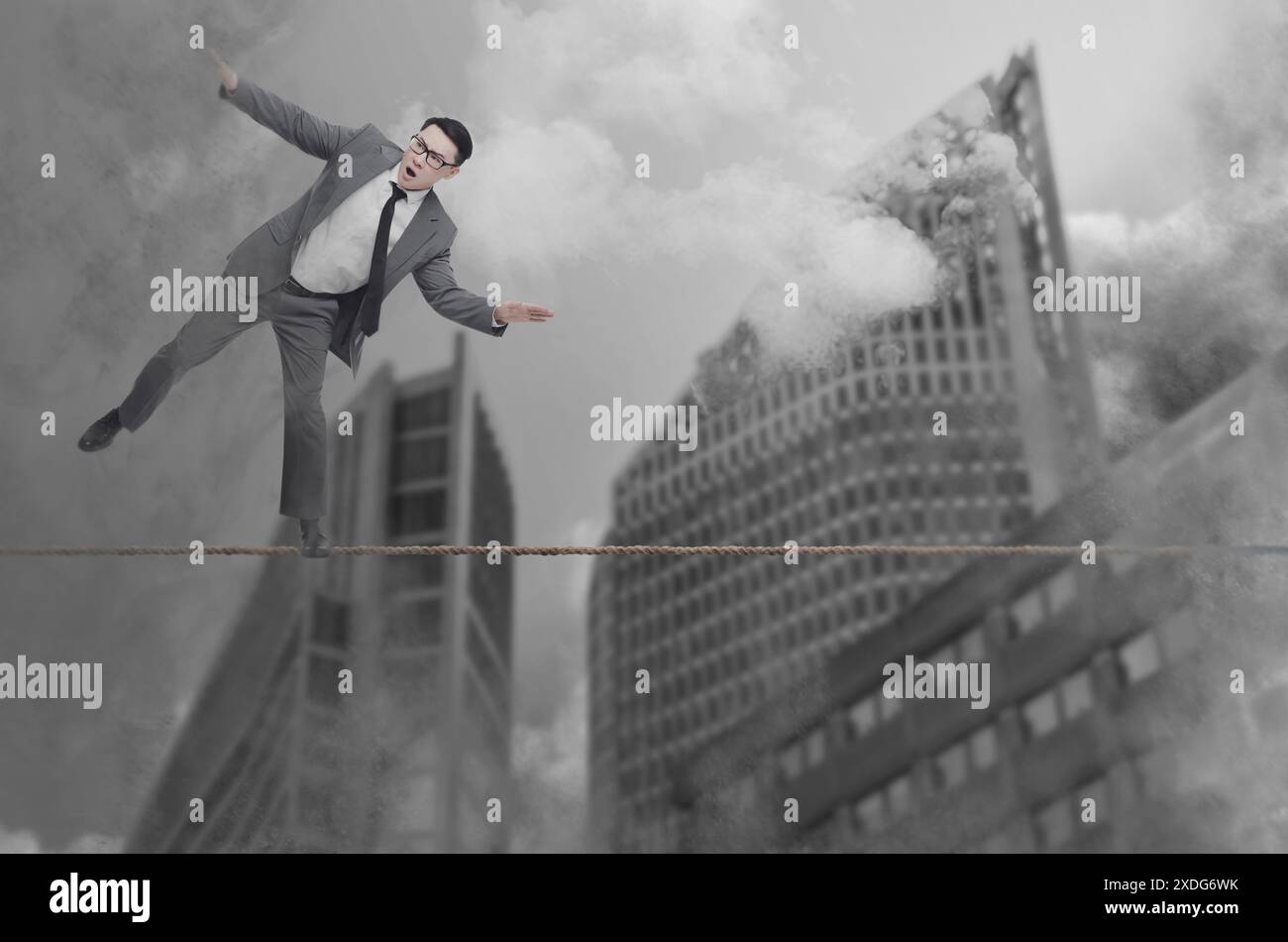 Businessman balancing on rope hi-res stock photography and images - Alamy