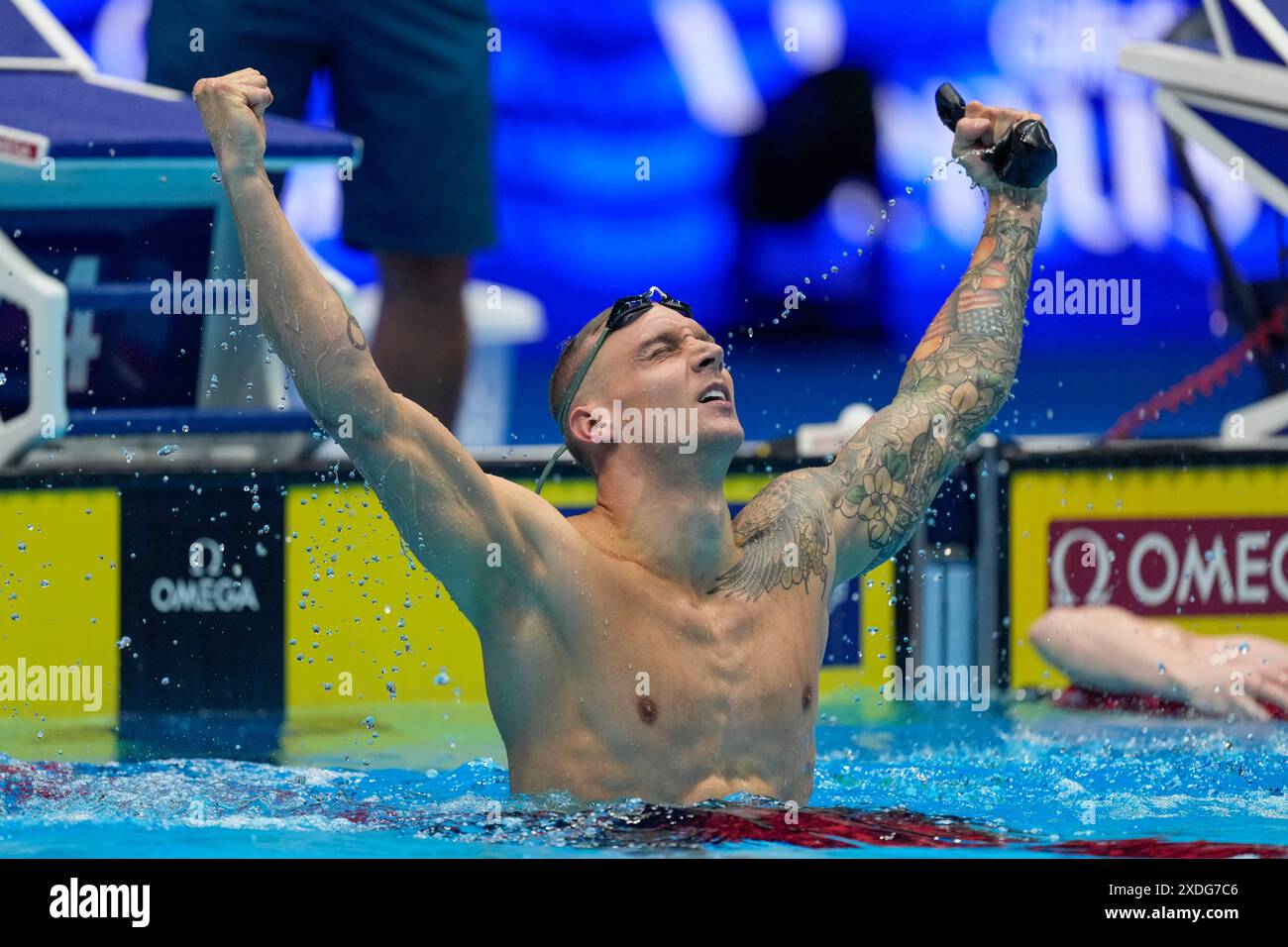 Caeleb Dressel reacts after winning the Men's 100 butterfly finals ...