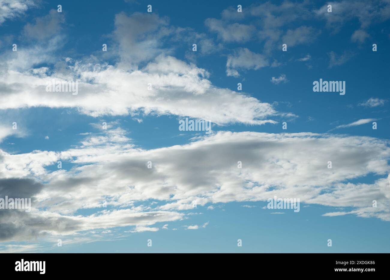 Nature, sunshine and clouds in blue sky with warm climate, texture and ...