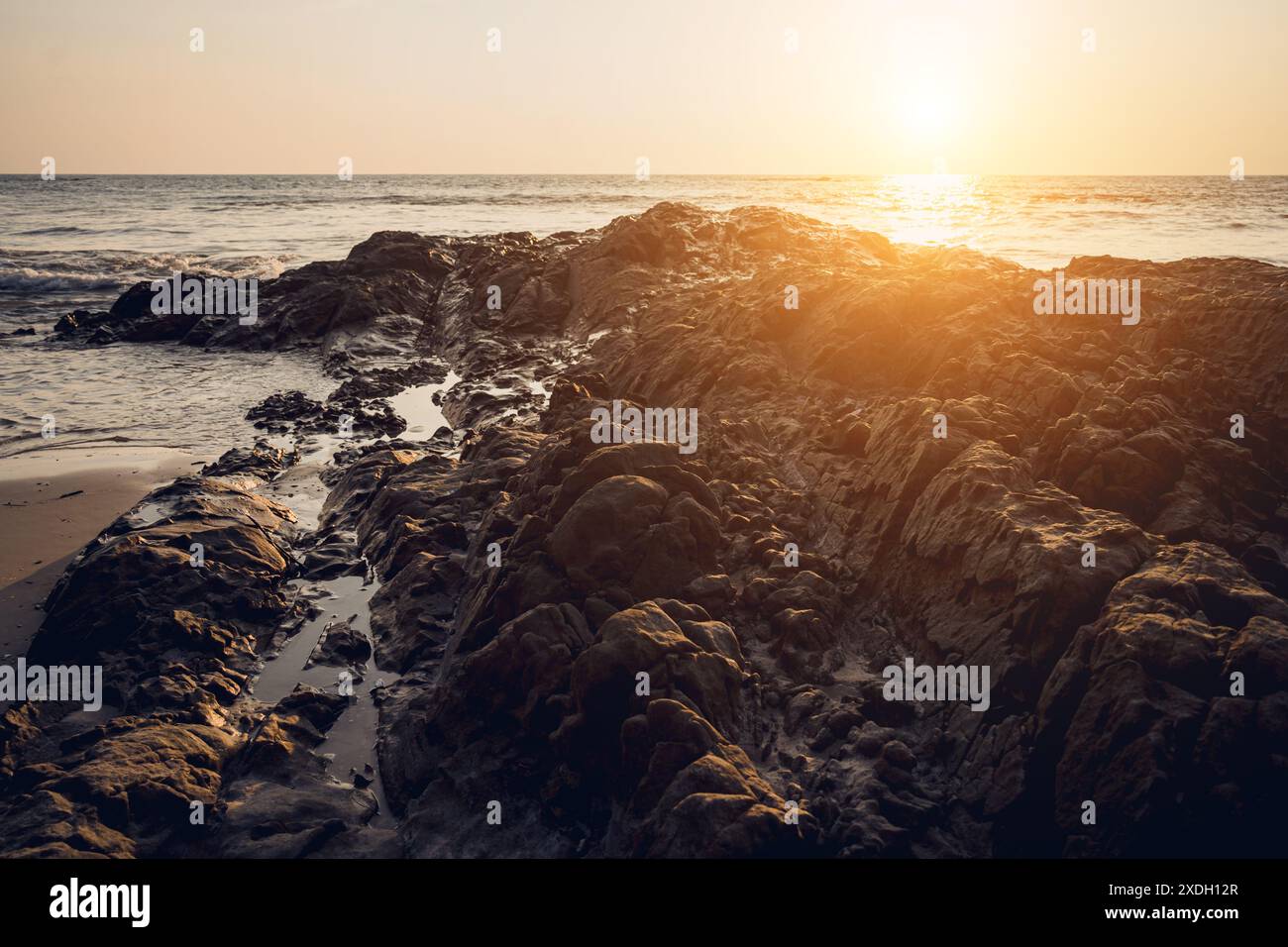 Ocean waves large rocks sand hi-res stock photography and images - Alamy