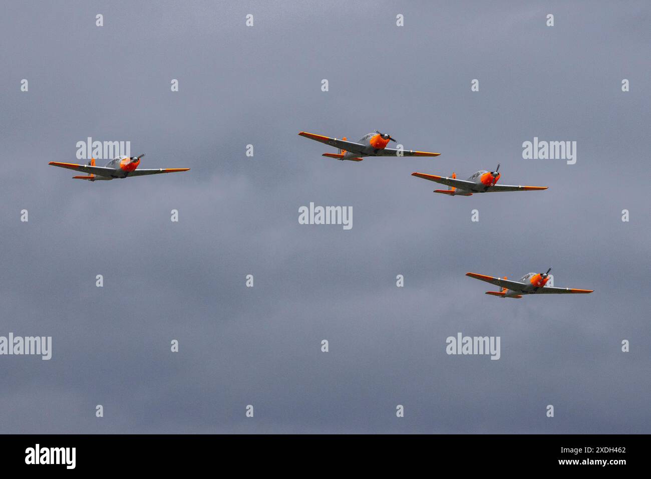 A formation of Saab Safir vintage airplanes performing at an airshow in Finland Stock Photo