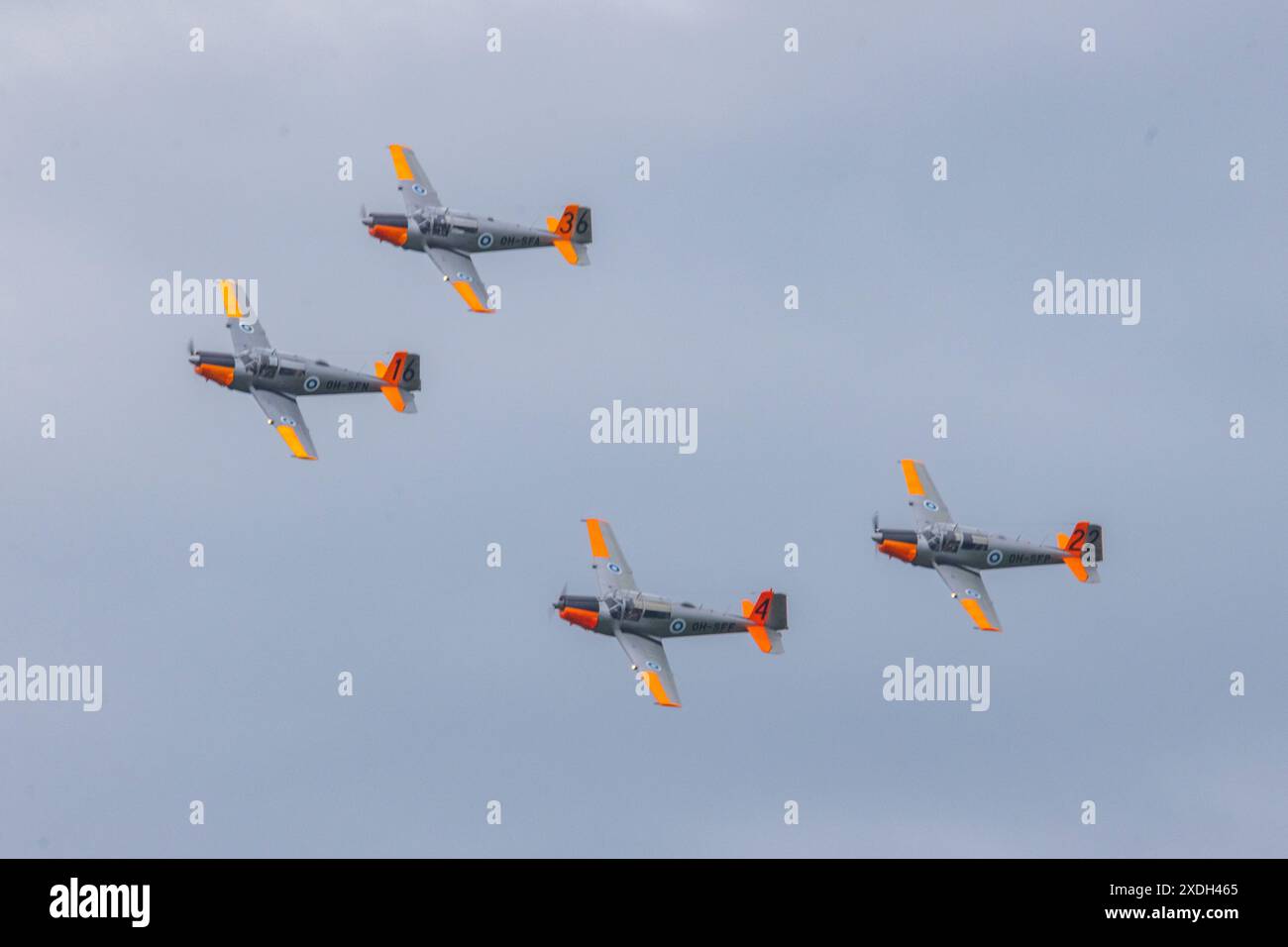 A formation of Saab Safir vintage airplanes performing at an airshow in Finland Stock Photo