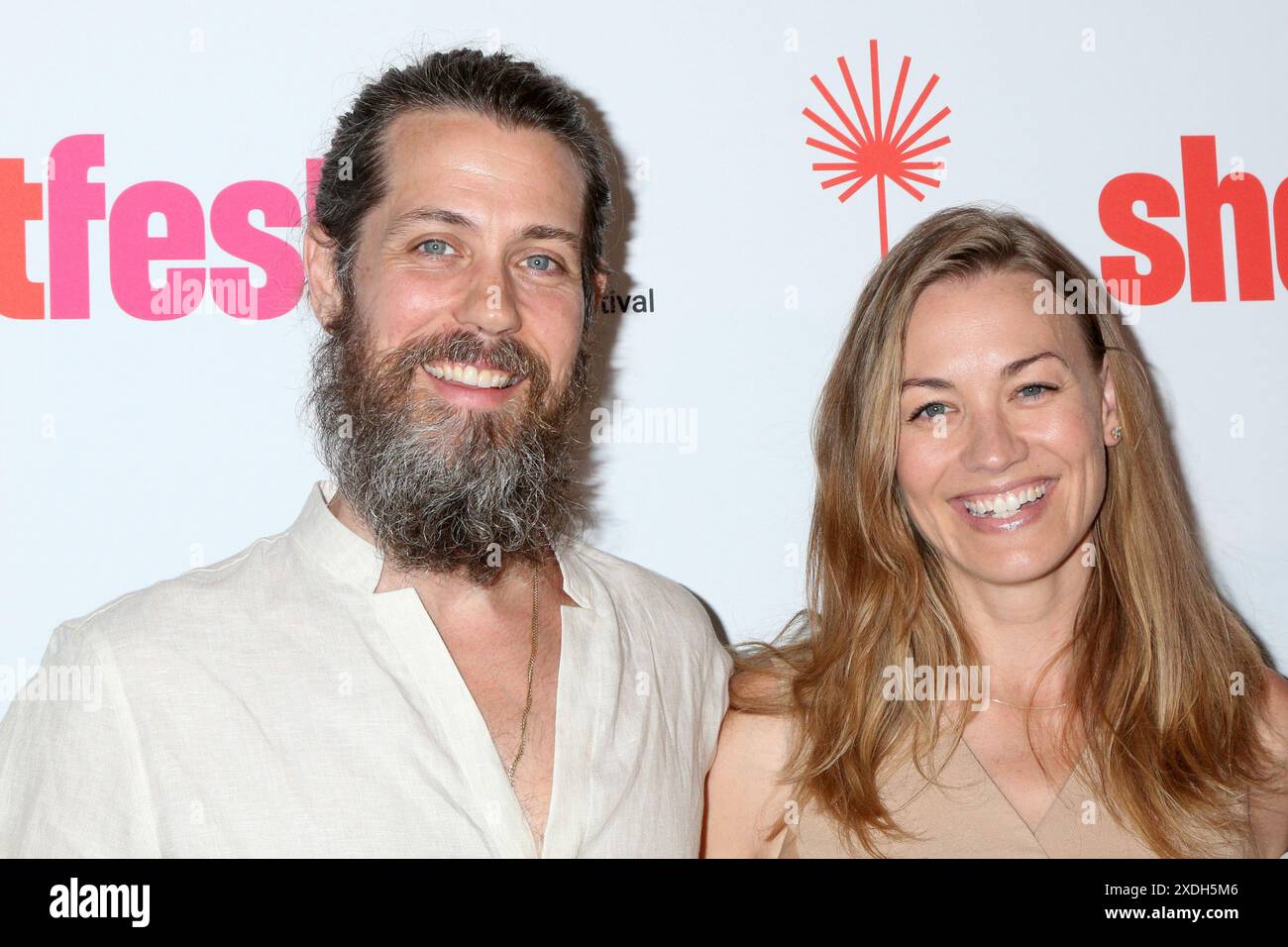 LOS ANGELES JUN 22 Tim Loden, Yvonne Strahovski at the 30th Palm