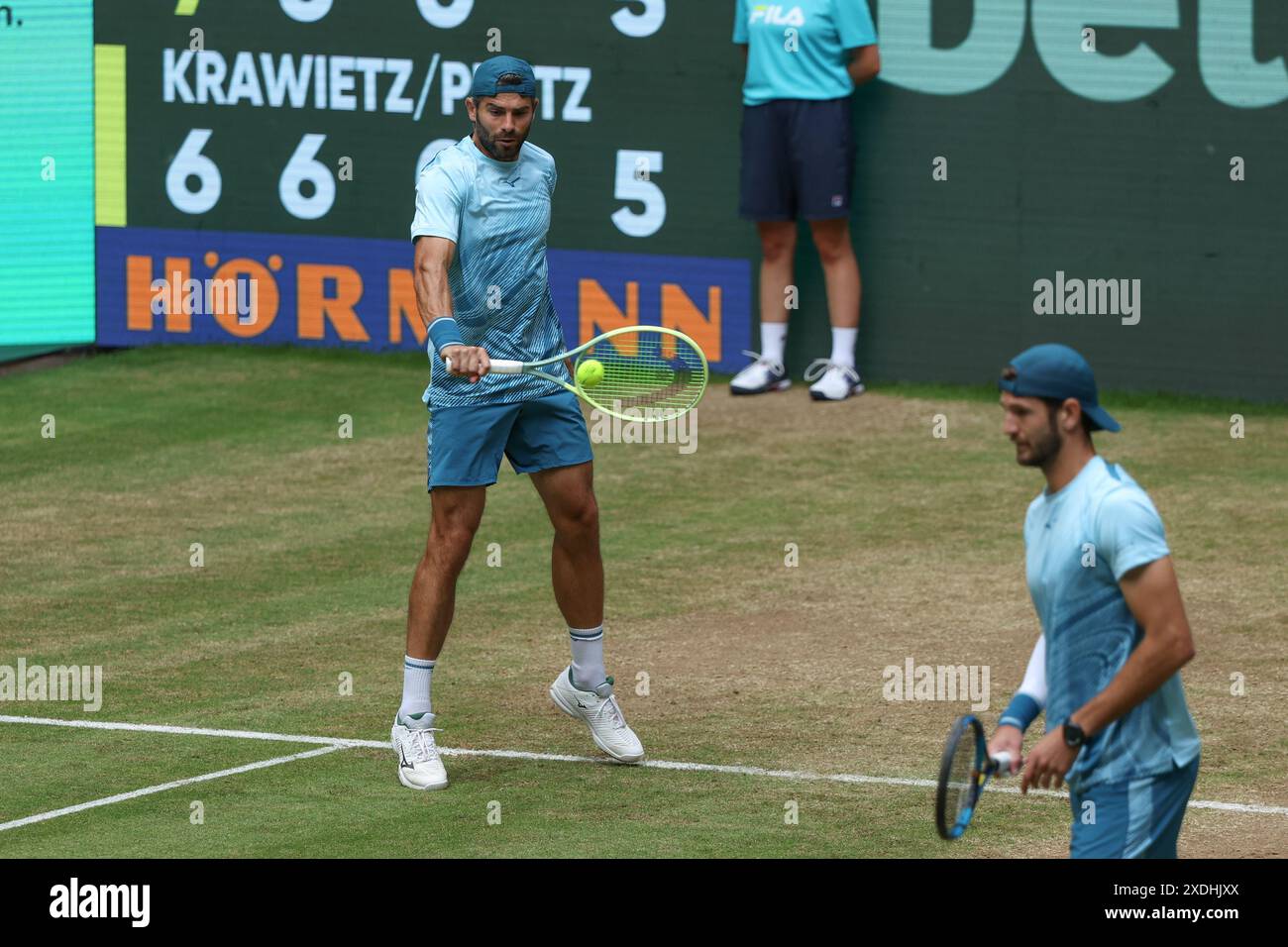Halle, Germany. 23rd June, 2024. Tennis: ATP Tour, doubles, final, Bolelli and Vavassori (Italy) - Krawietz and Pütz (Germany). Simone Bolelli (l-r) and Andrea Vavassori stand on the court. Credit: Friso Gentsch/dpa/Alamy Live News Stock Photo